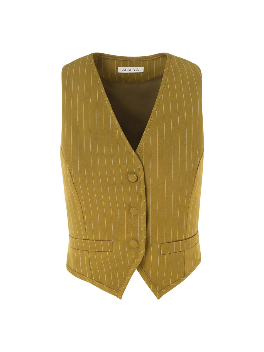 Close-up of deep V neckline on moss green vest for women – ALALYA fashion